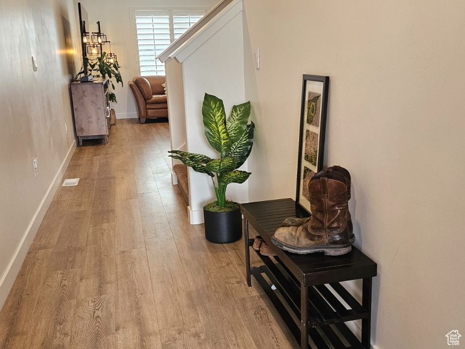 Entry with light hardwood / wood-style flooring