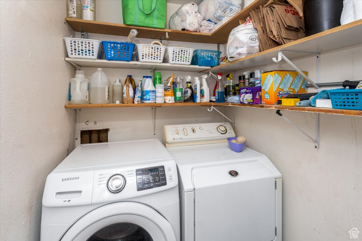 Laundry area with laundry area and washing machine and dryer