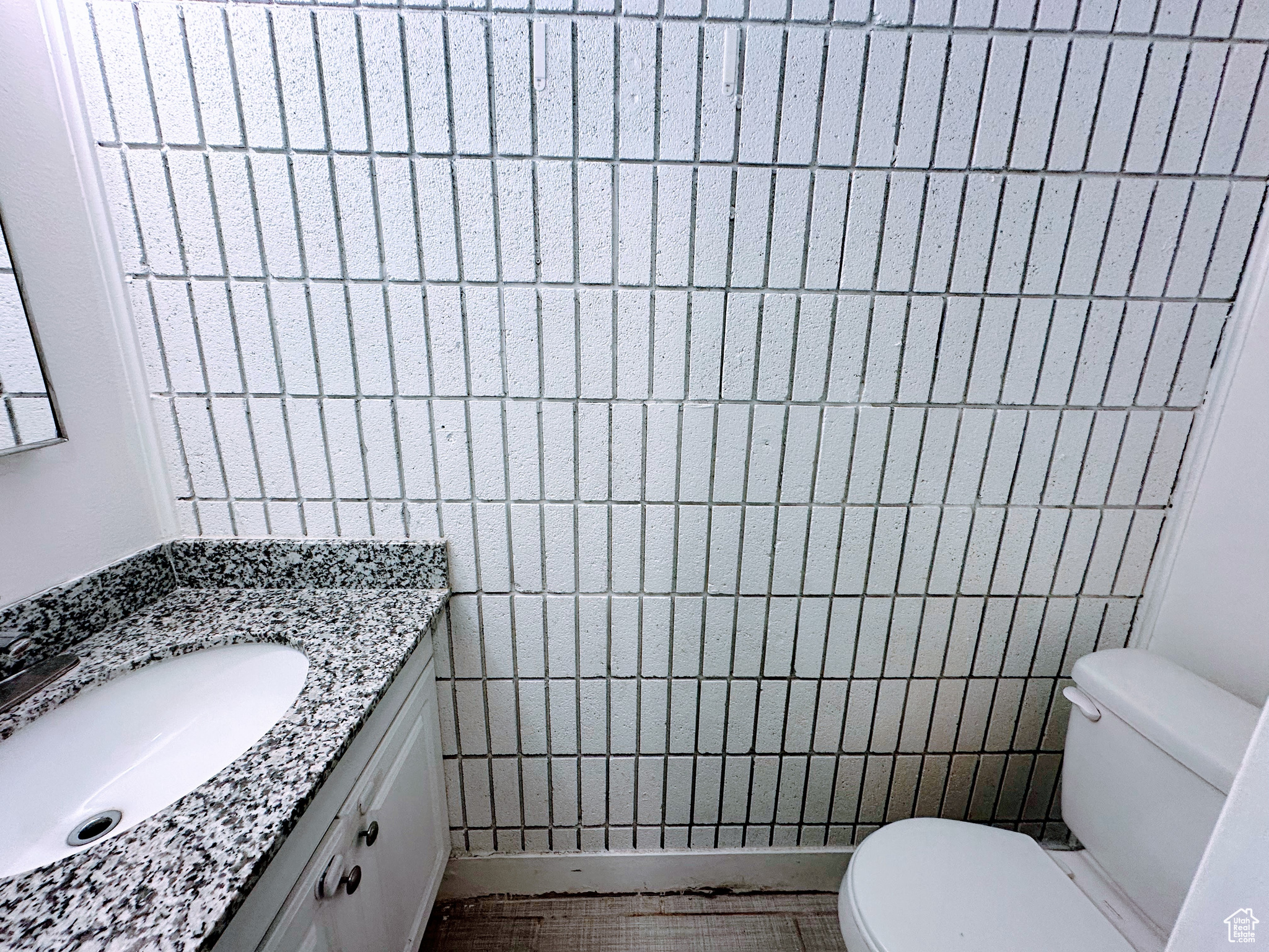 Bathroom with vanity and toilet