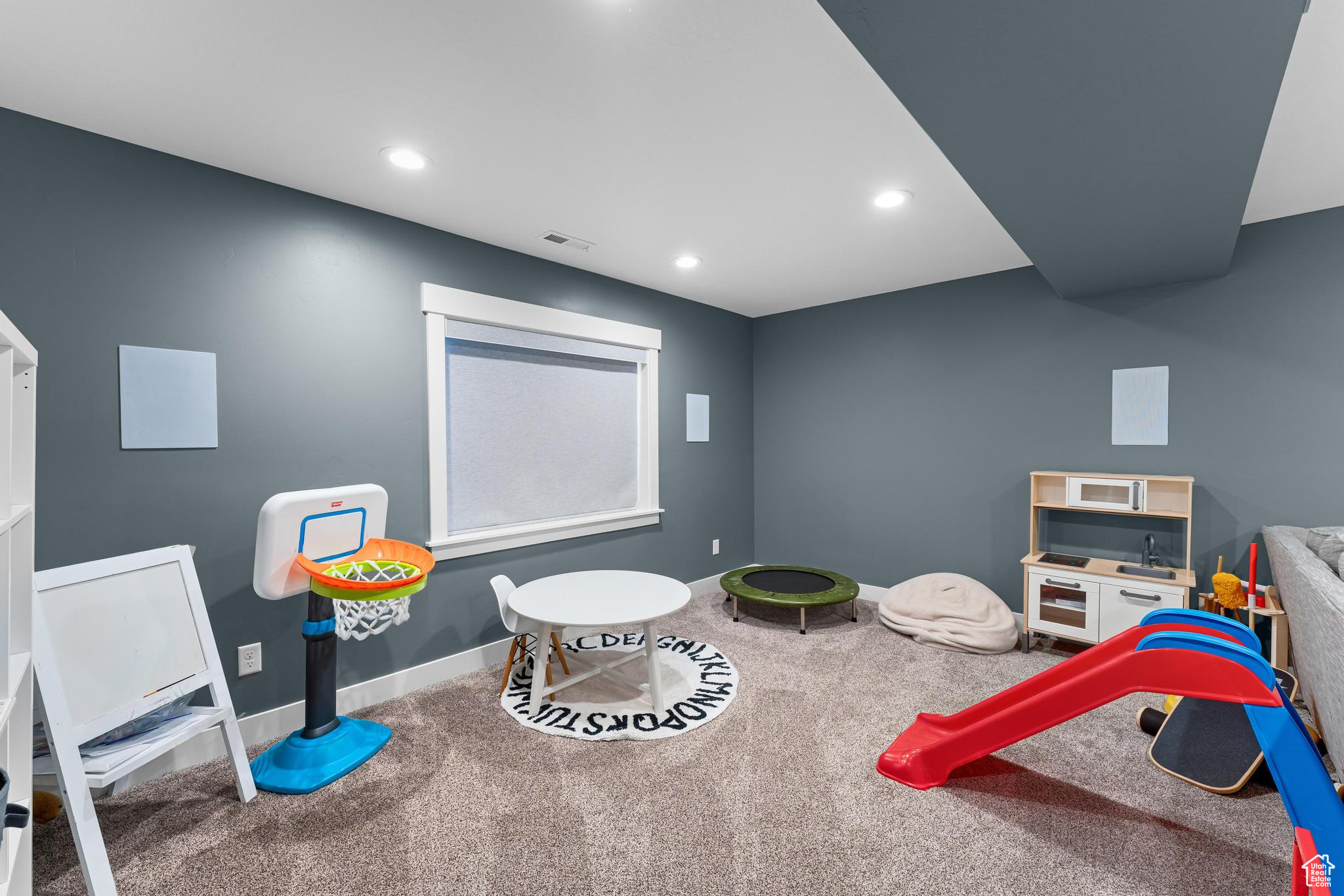 Recreation room featuring recessed lighting, carpet flooring