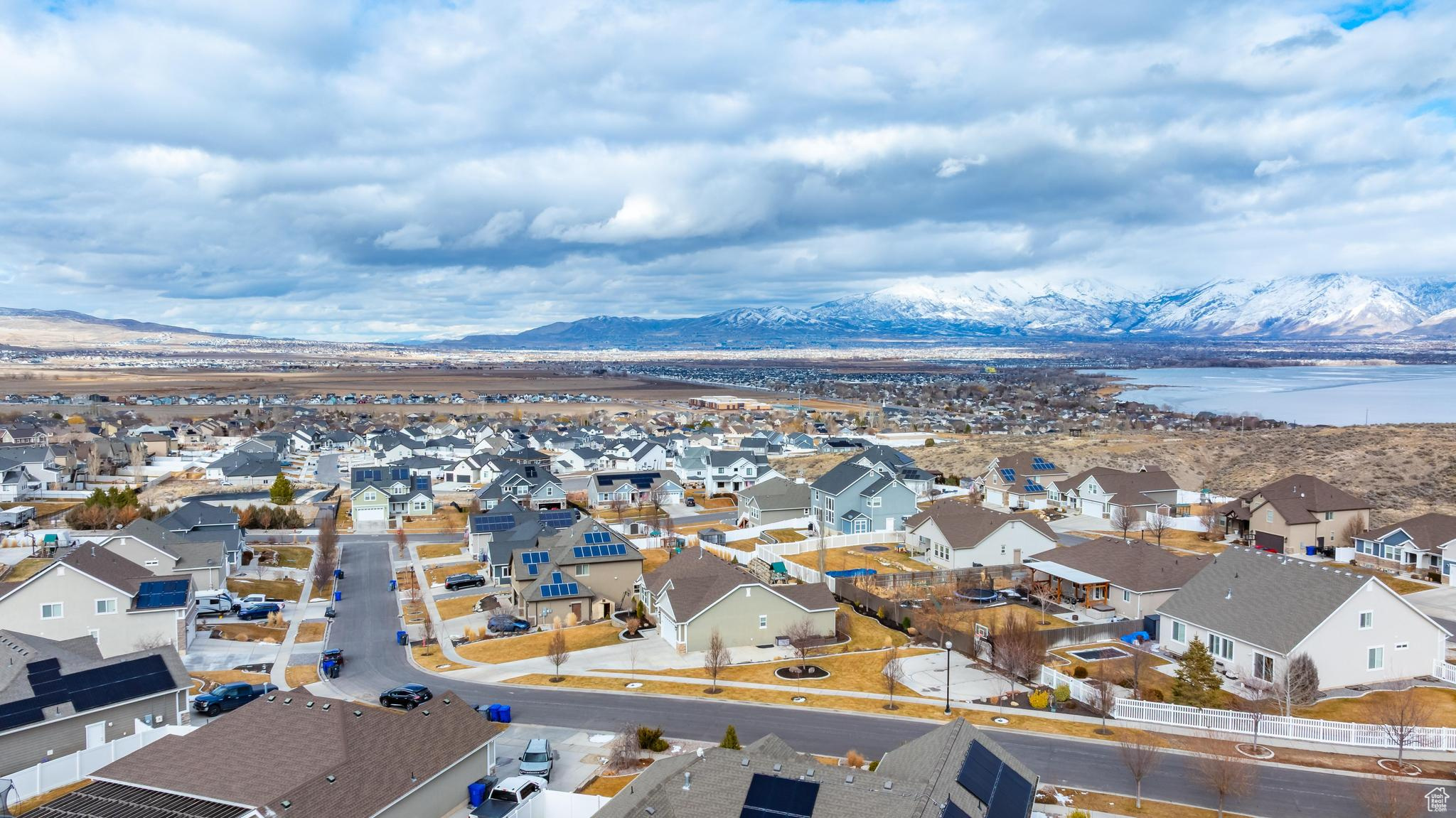 Drone / aerial view with a residential view and a mountain view