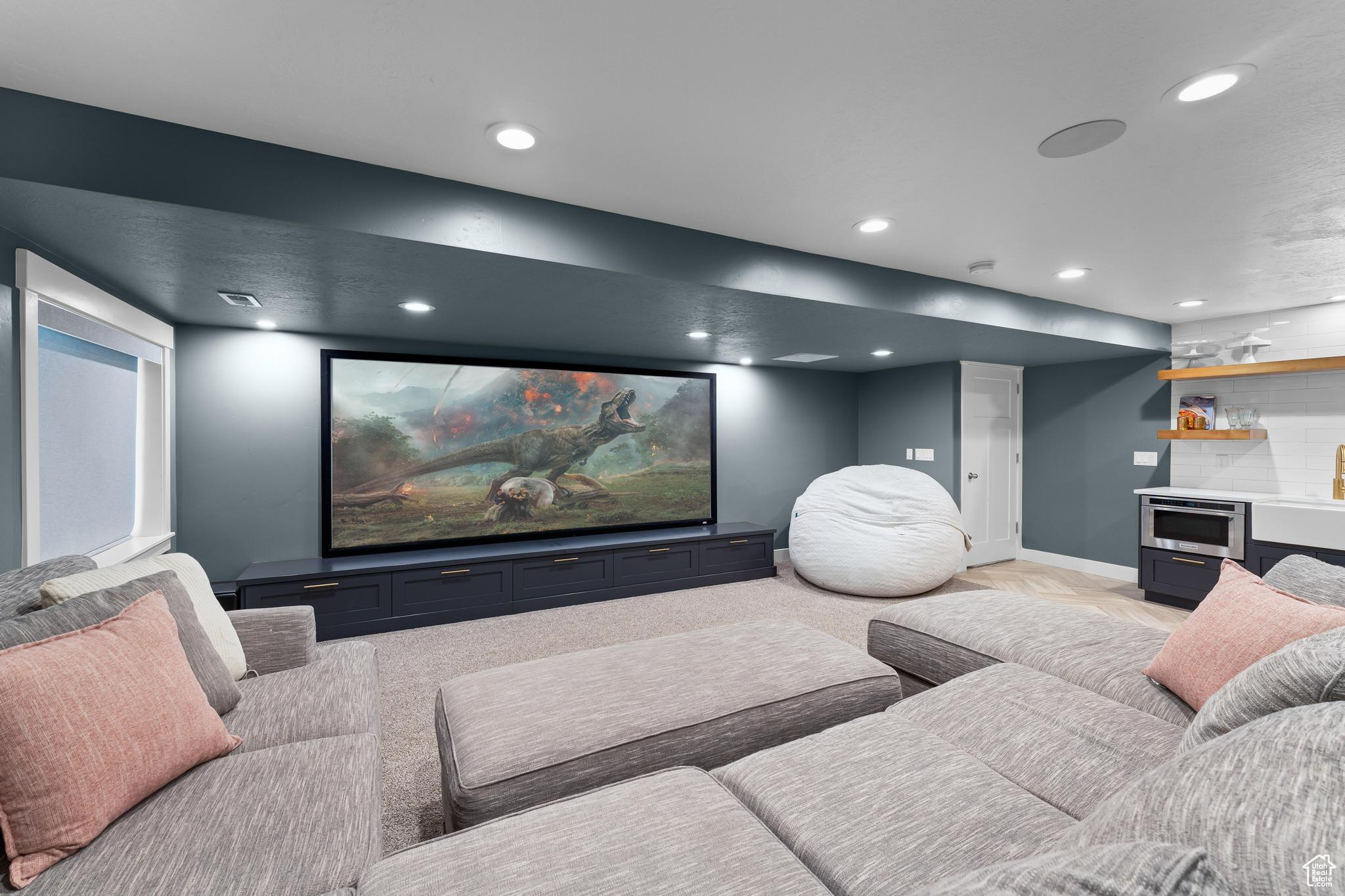 Home theater room with recessed lighting