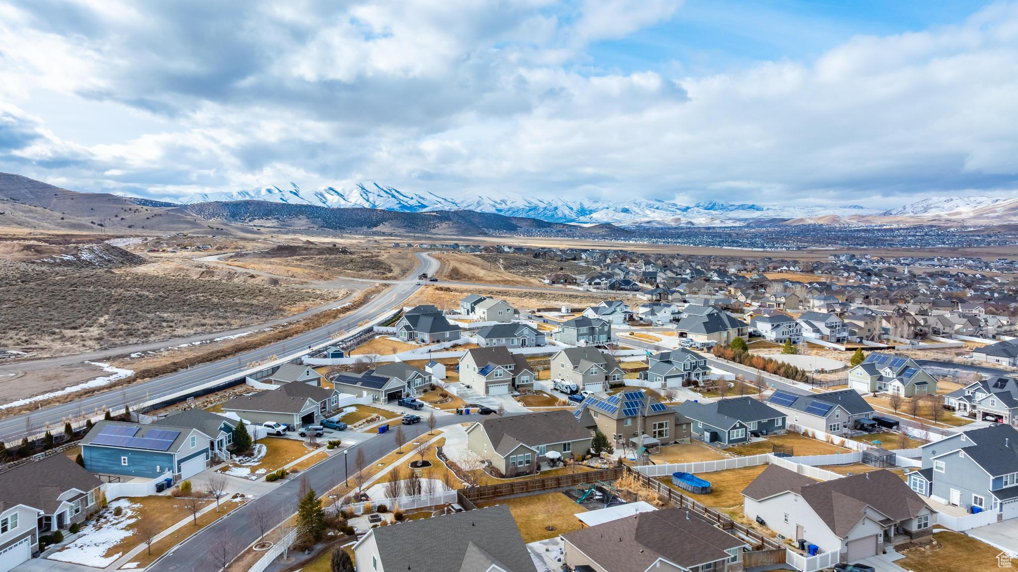 Birds eye view of property featuring a residential view and a mountain view