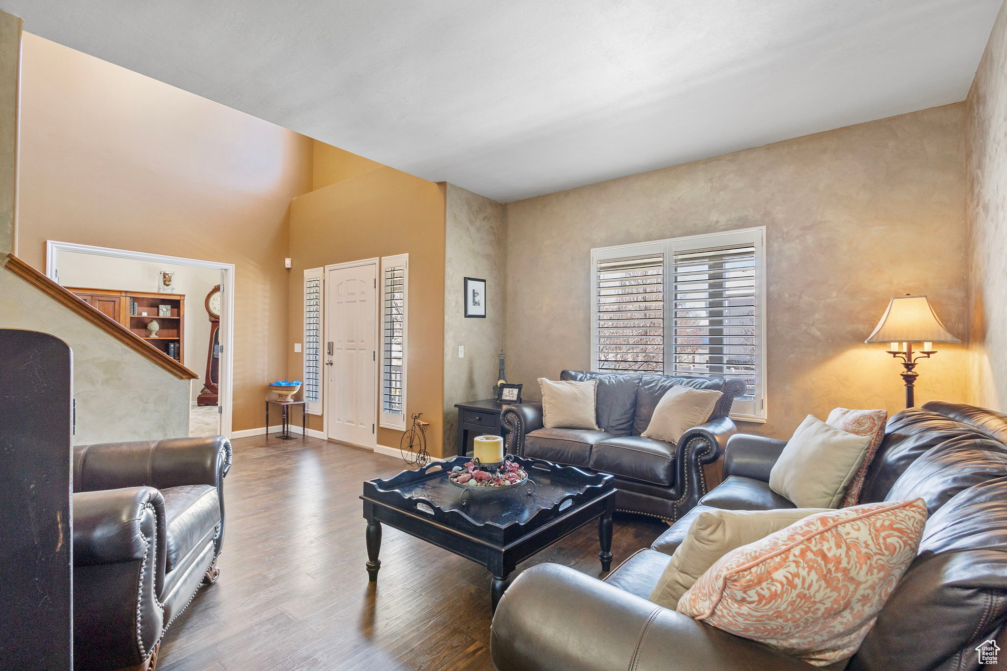 Living room featuring dark hardwood / wood-style flooring