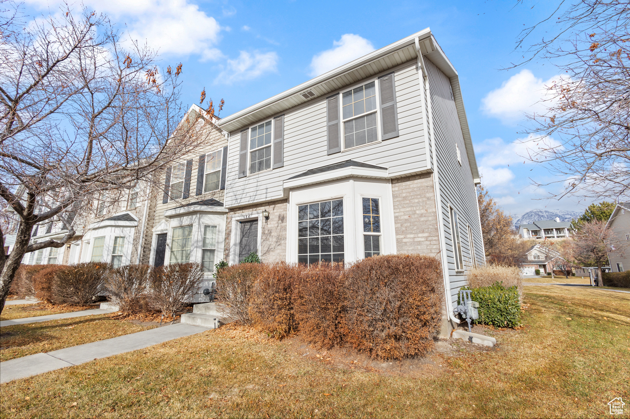 View of front of property featuring a front lawn