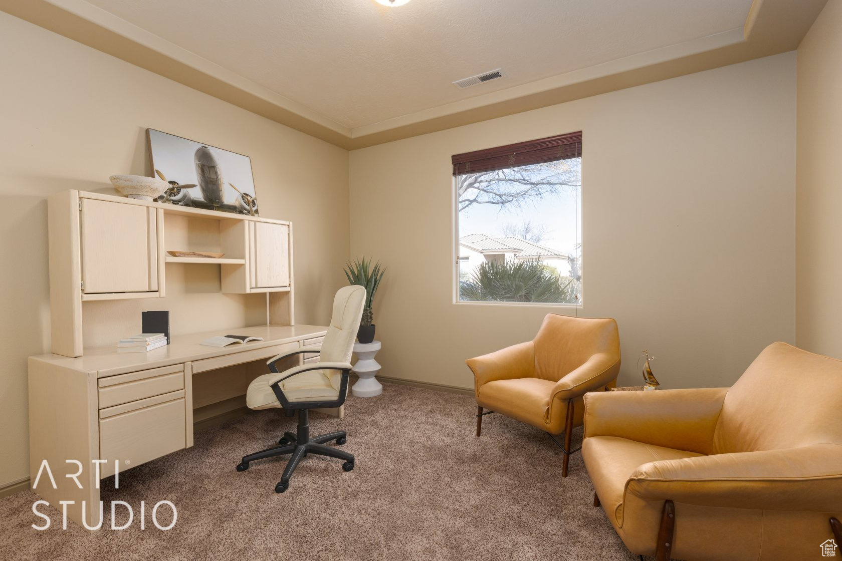 View of carpeted home office