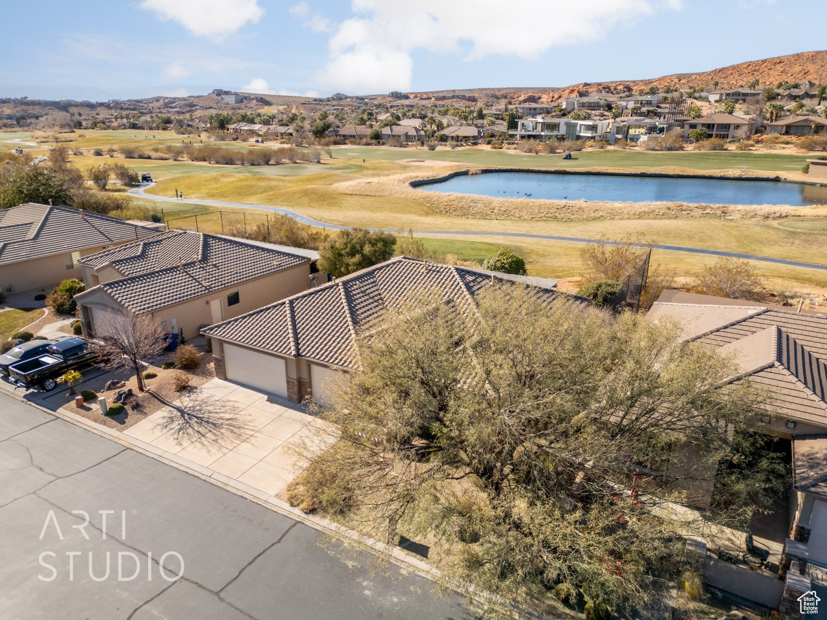 Aerial view featuring a water view