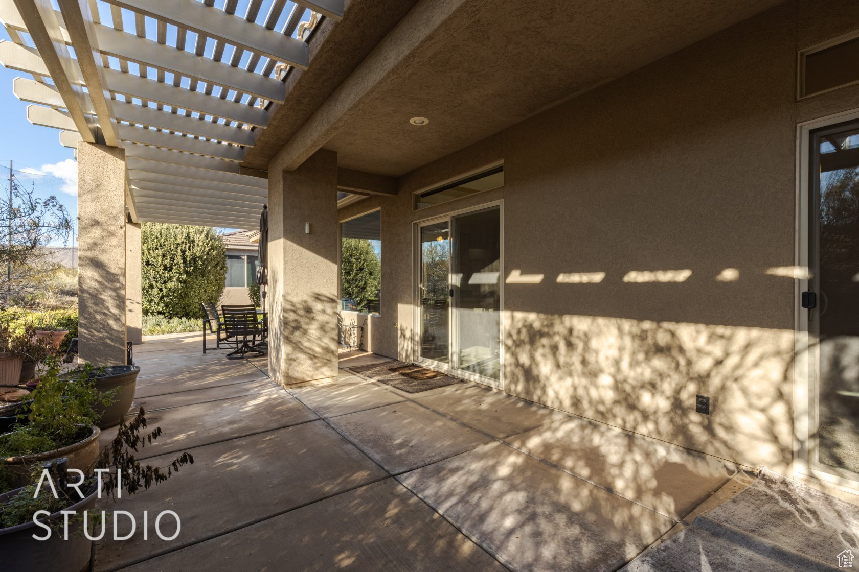 View of patio with a pergola