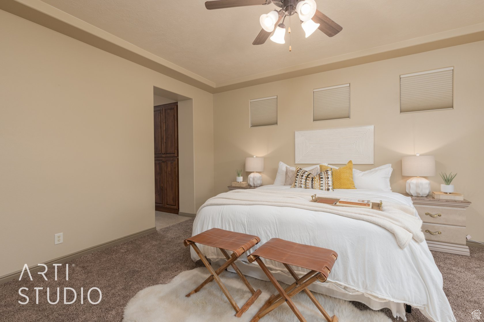 Bedroom featuring ceiling fan and carpet flooring
