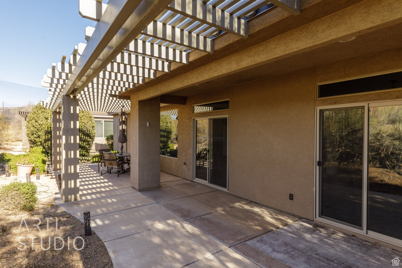 View of patio with a pergola
