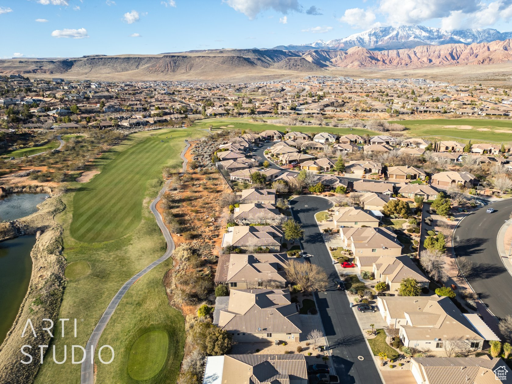 Birds eye view of property with a mountain view