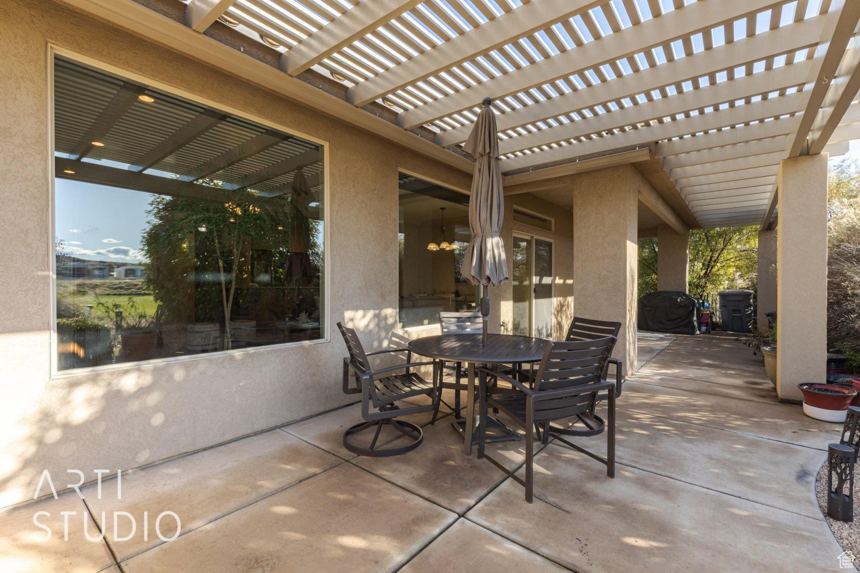 View of patio featuring a pergola