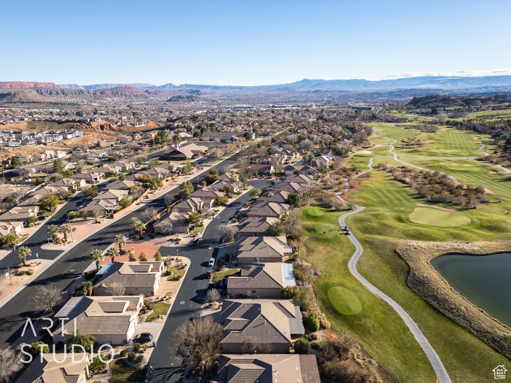 Aerial view featuring a water and mountain view