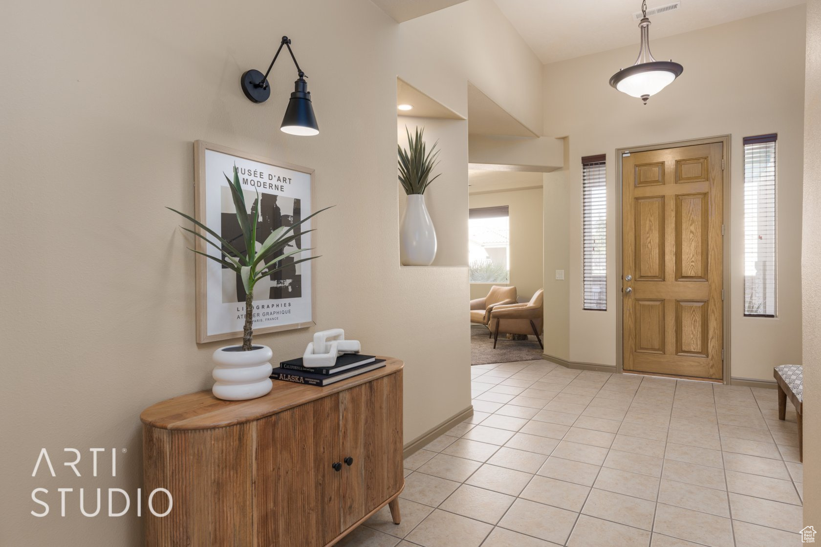 Entryway with light tile patterned floors