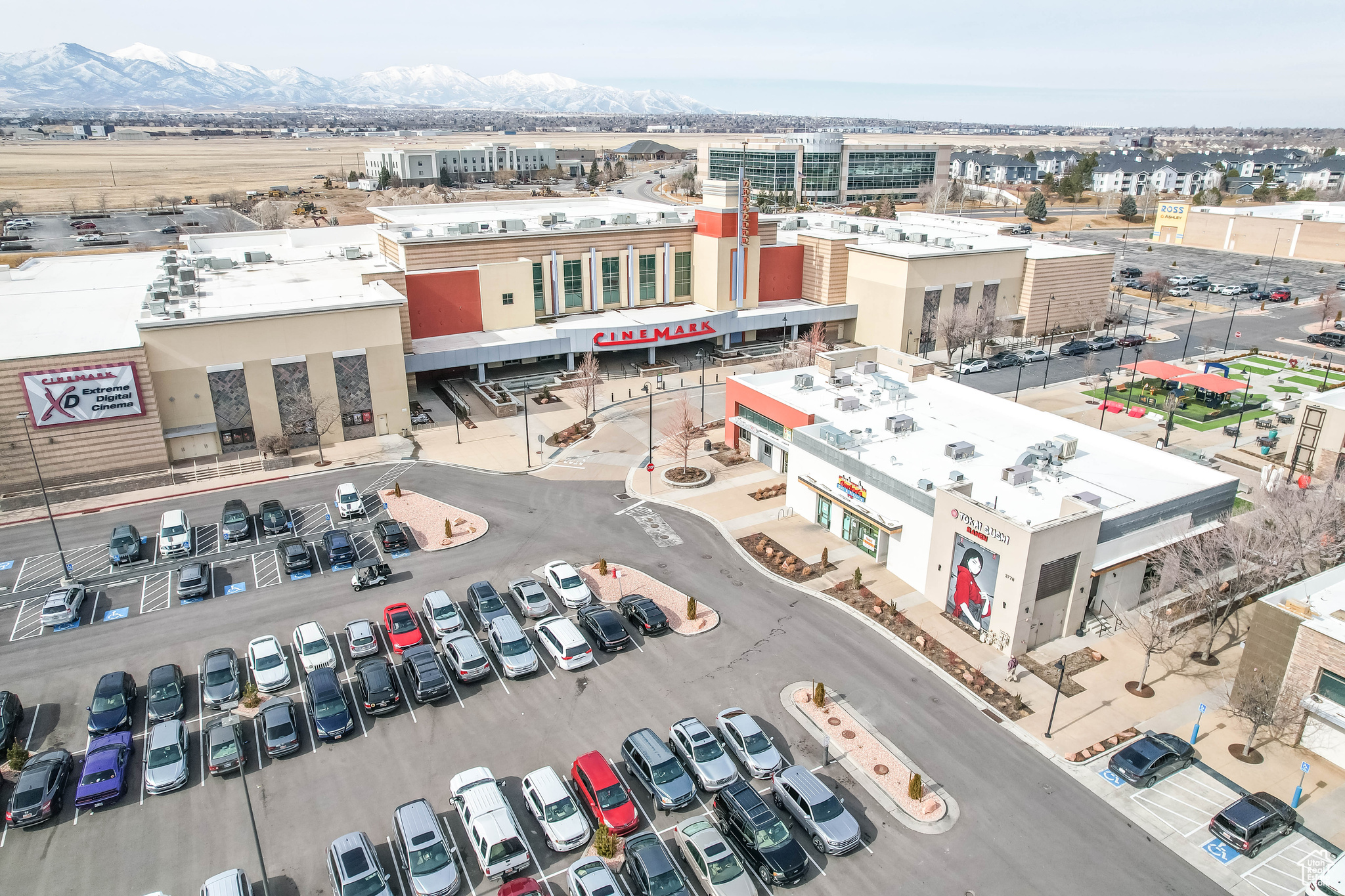 Birds eye view of property with a view of city and a mountain view