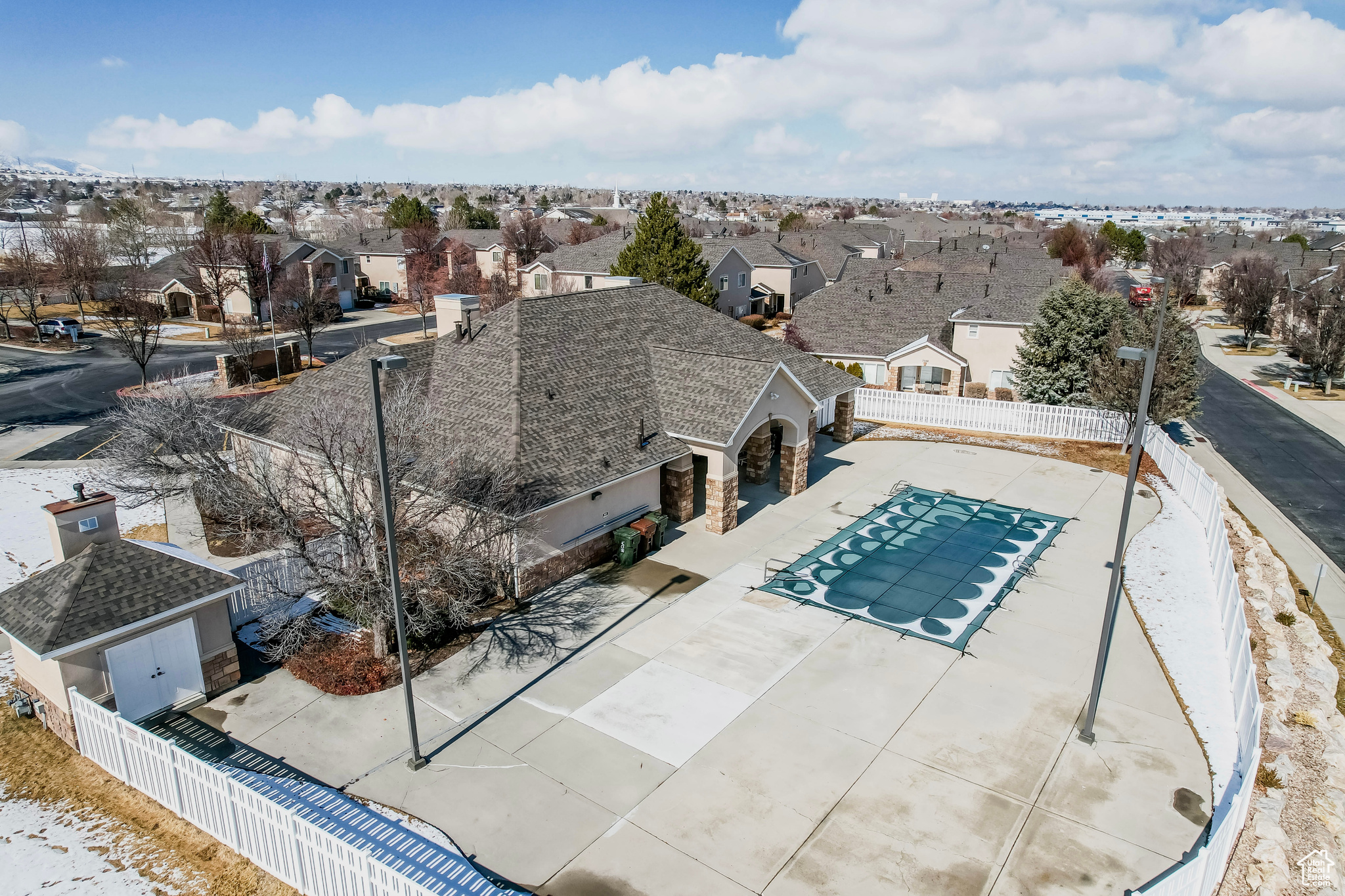 View of swimming pool with a patio area, a fenced backyard, and a residential view