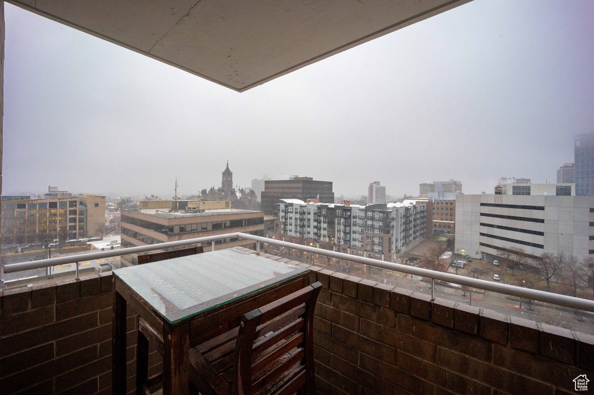 Balcony featuring a view of city
