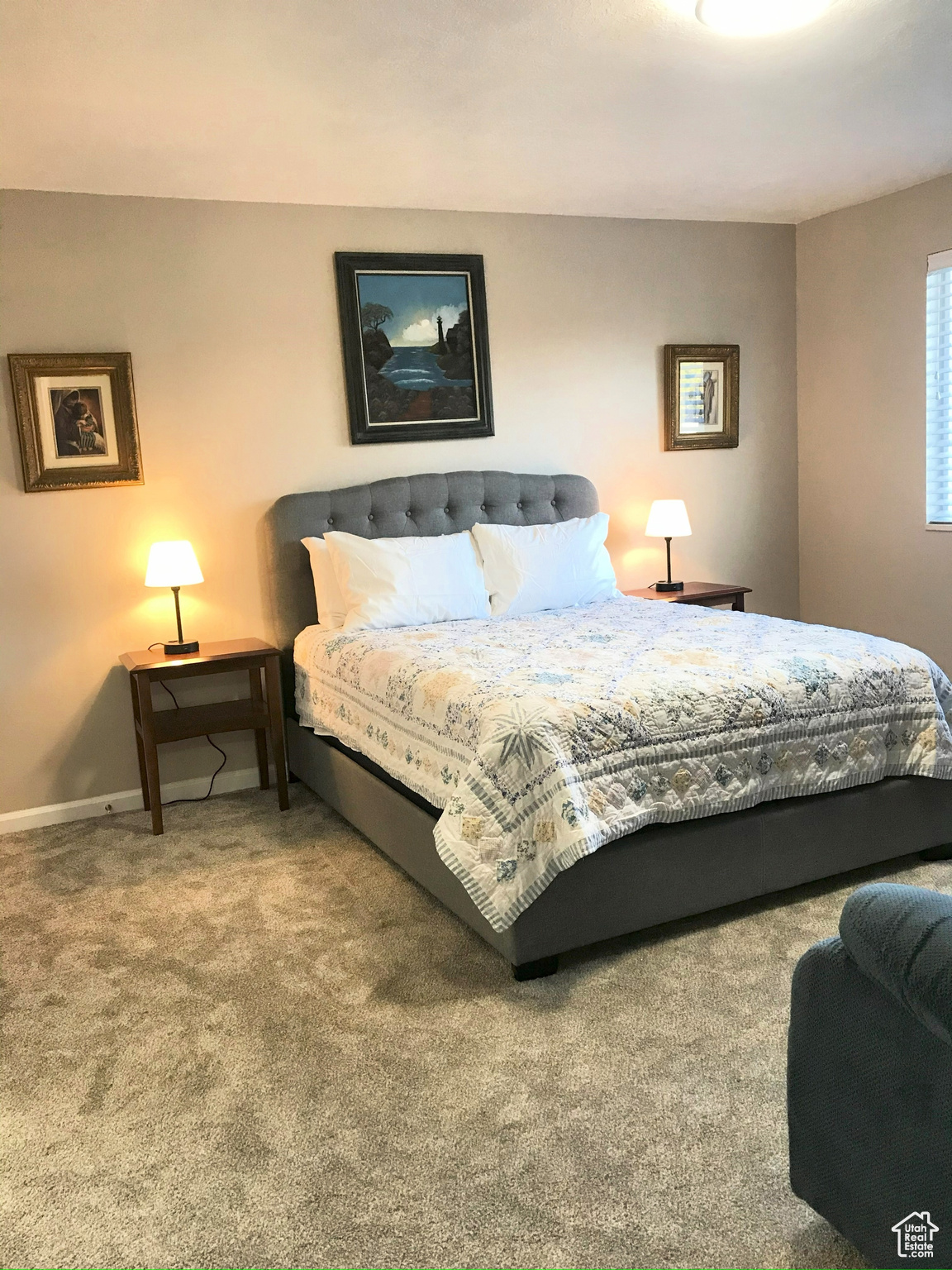 Bedroom with baseboards and carpet flooring