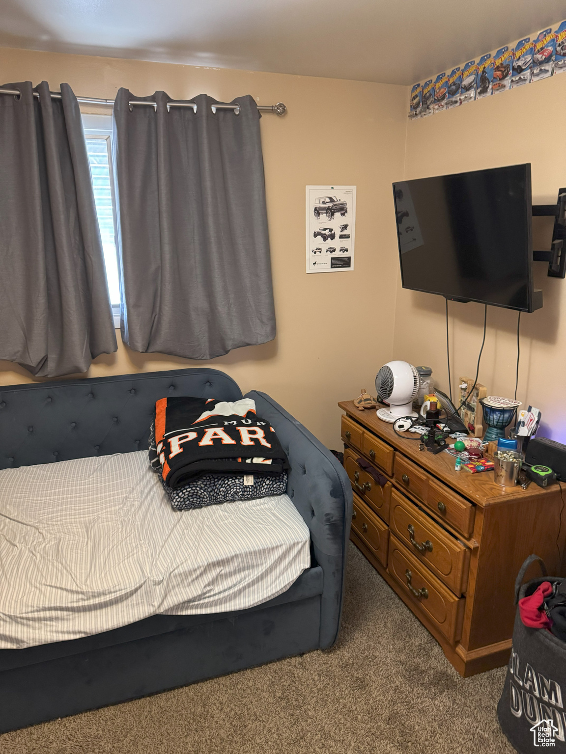 Bedroom featuring carpet flooring