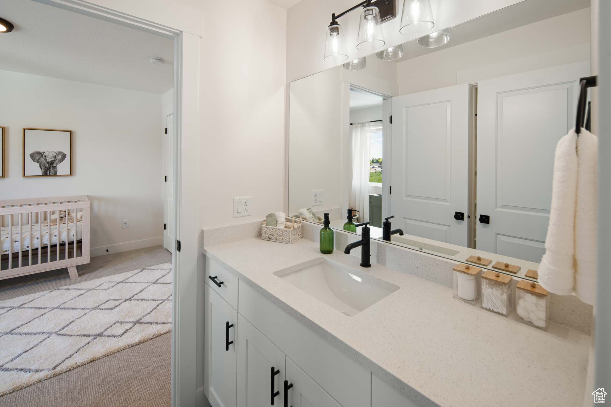 Bathroom with baseboards and vanity