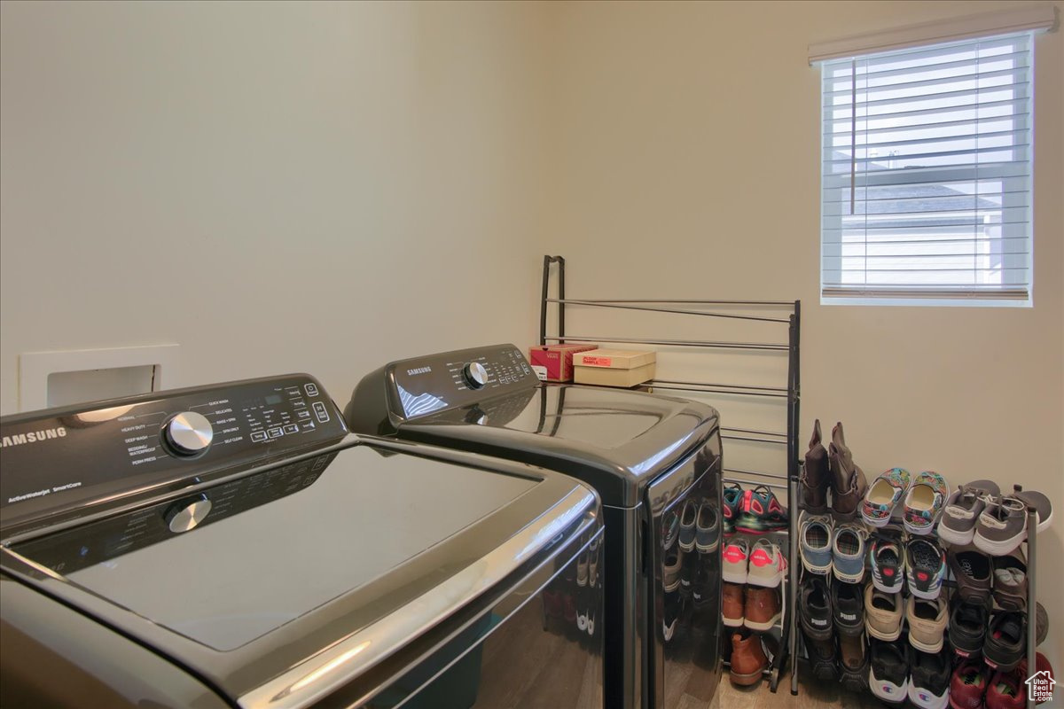 Laundry room featuring laundry area and separate washer and dryer