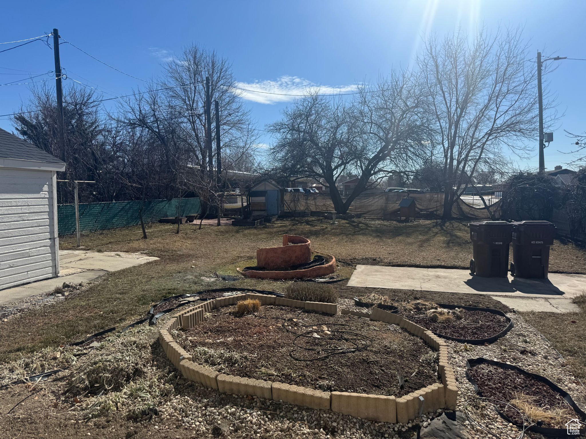 View of yard featuring fence