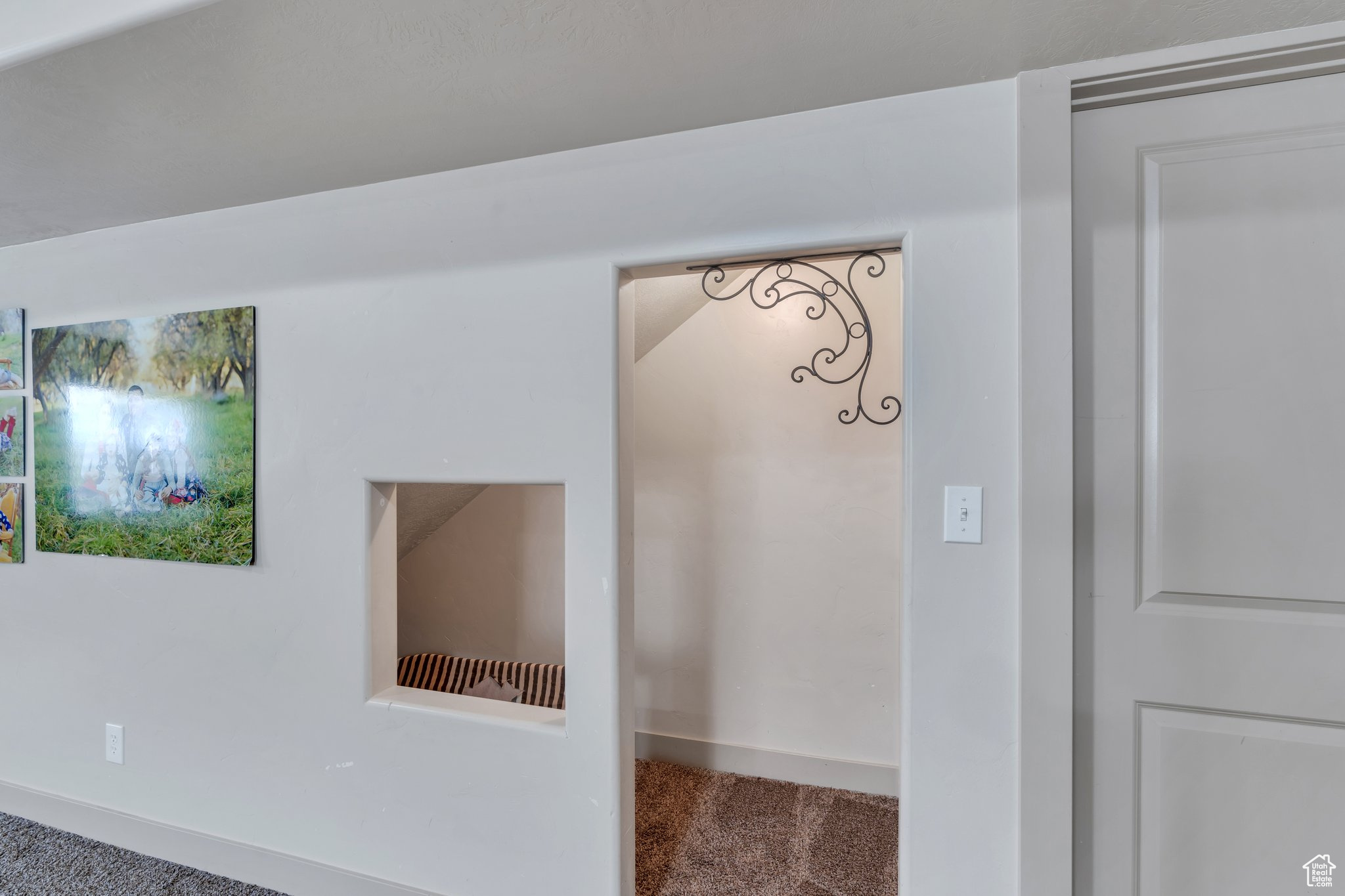 Interior details with carpet and baseboards