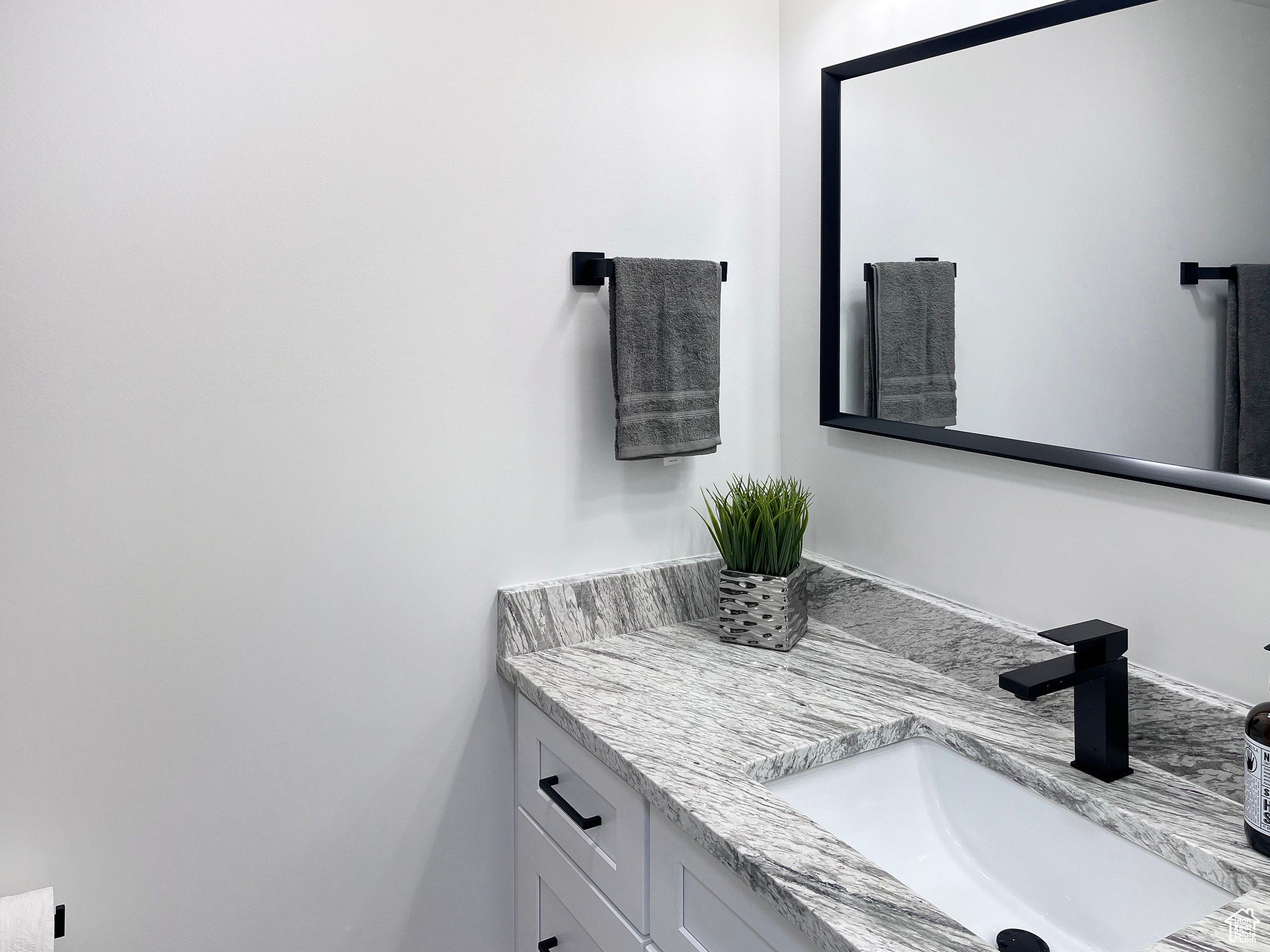 Beautifully updated bathroom with vanity