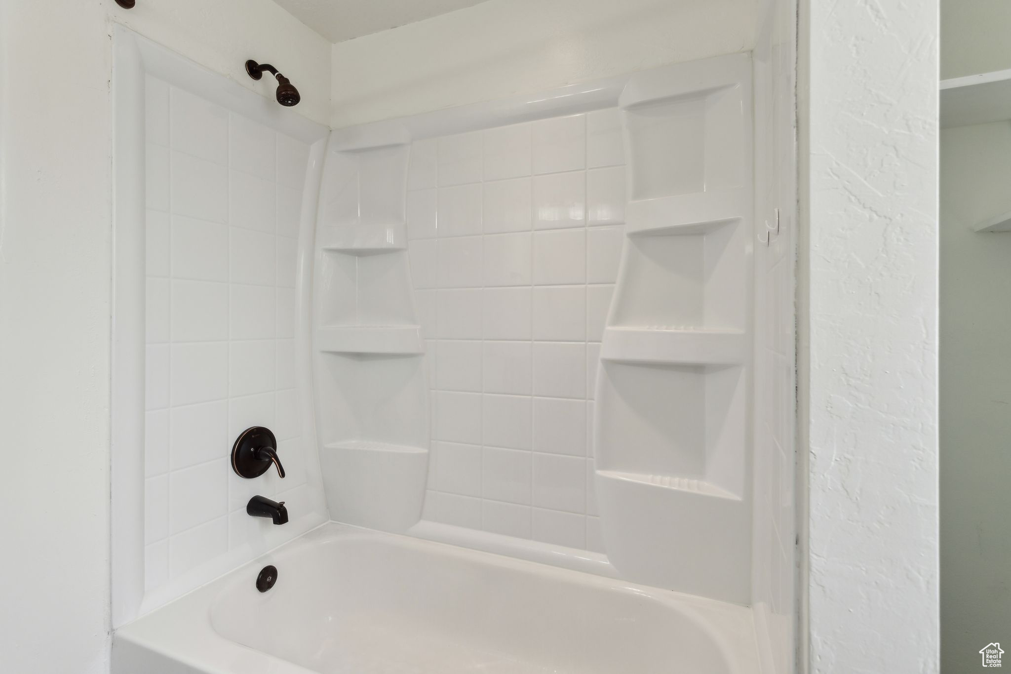 Bathroom featuring shower / bath combination