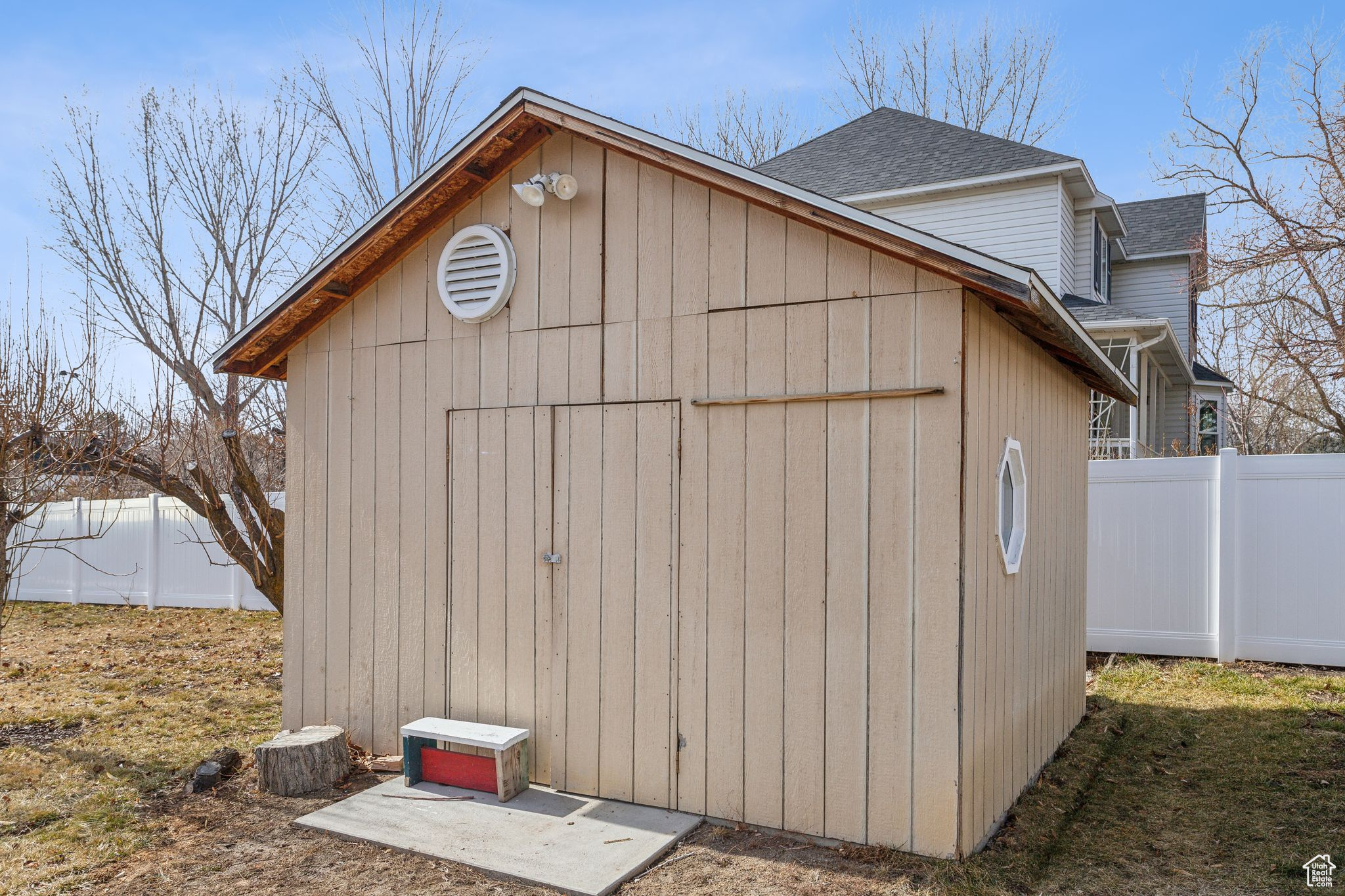 View of shed with fence