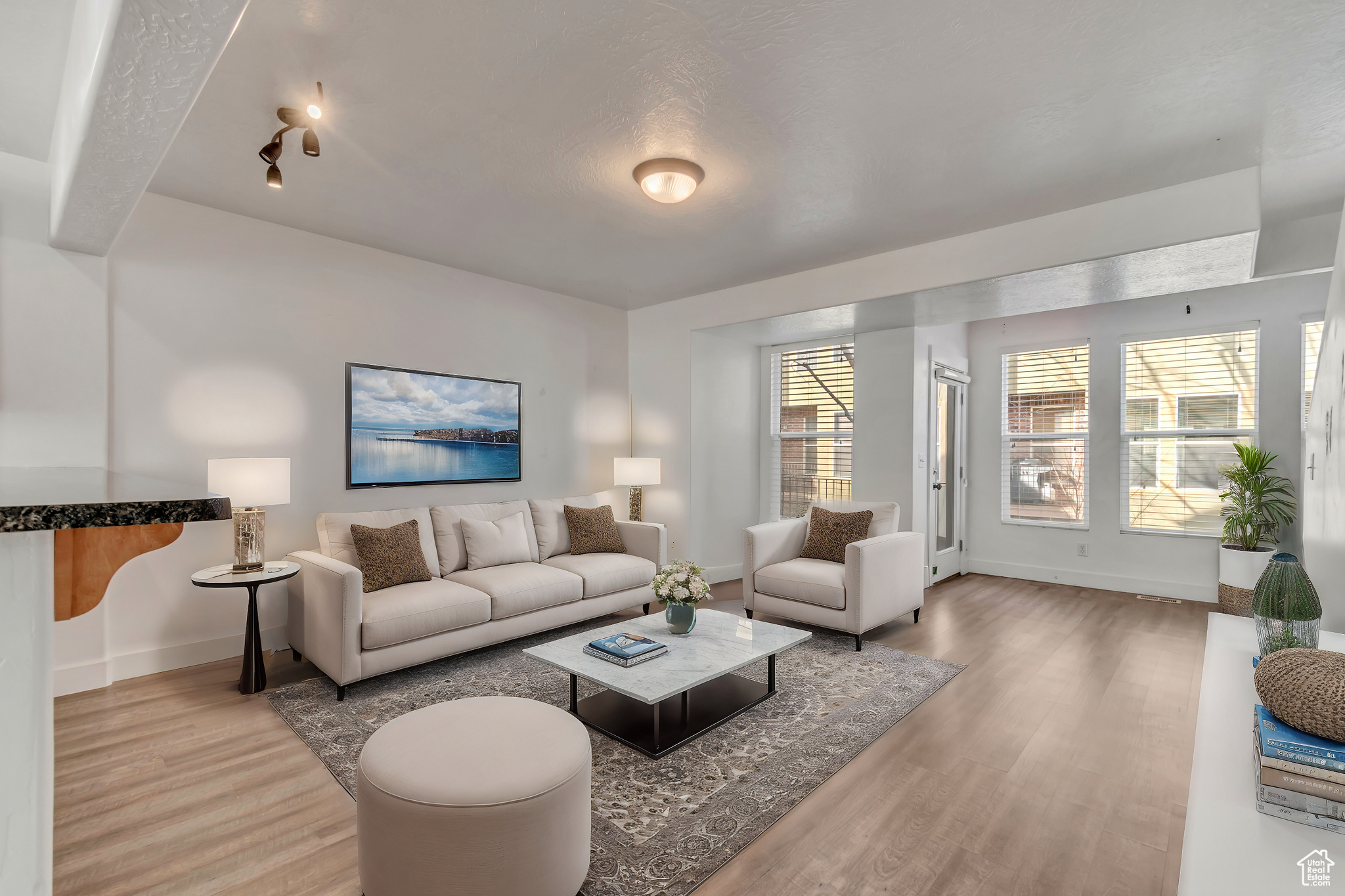 Living area featuring wood finished floors and baseboards