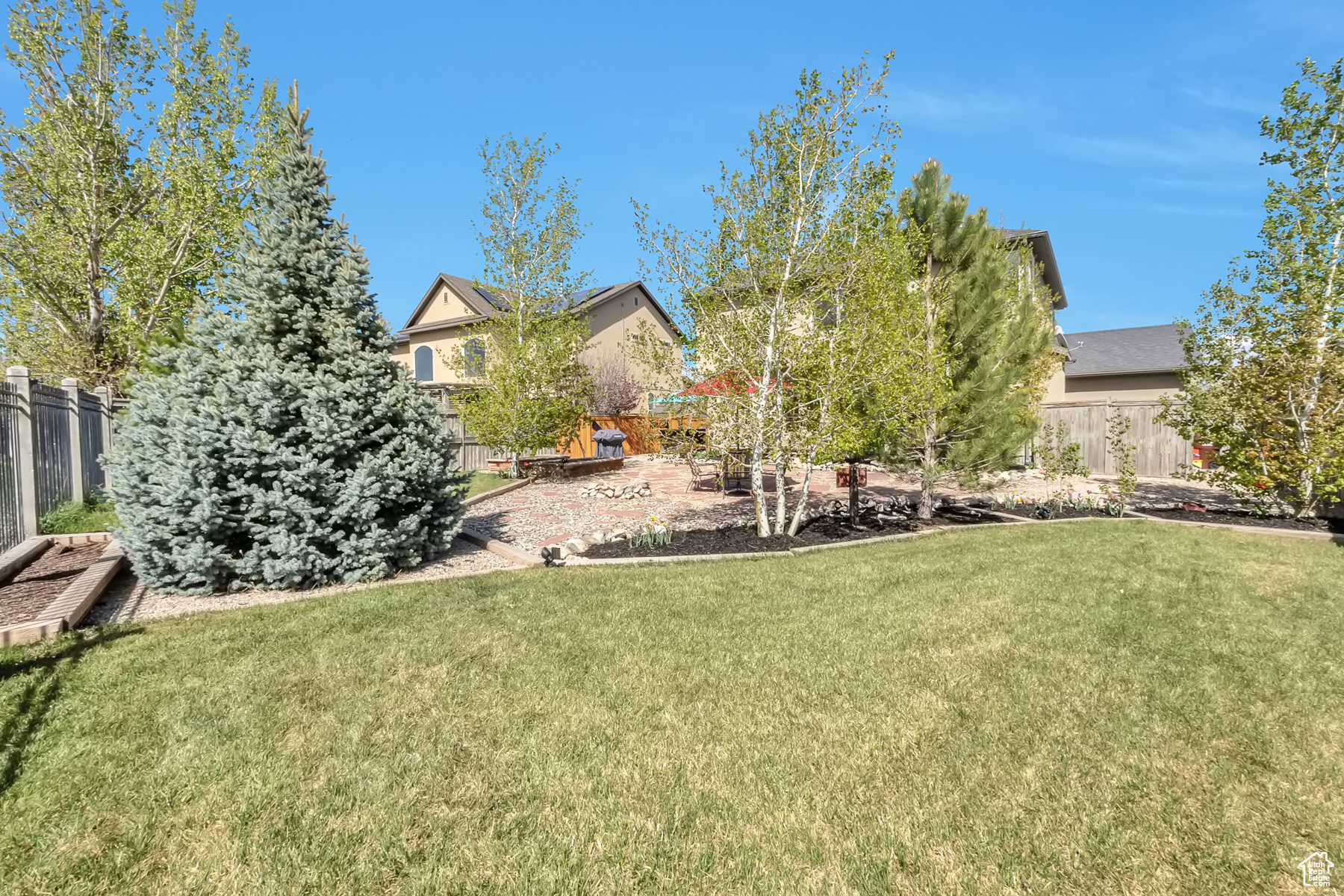 View of yard with fence