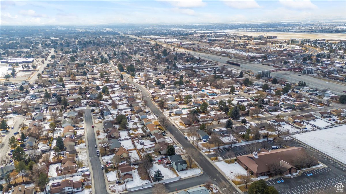 Birds eye view of property with a residential view