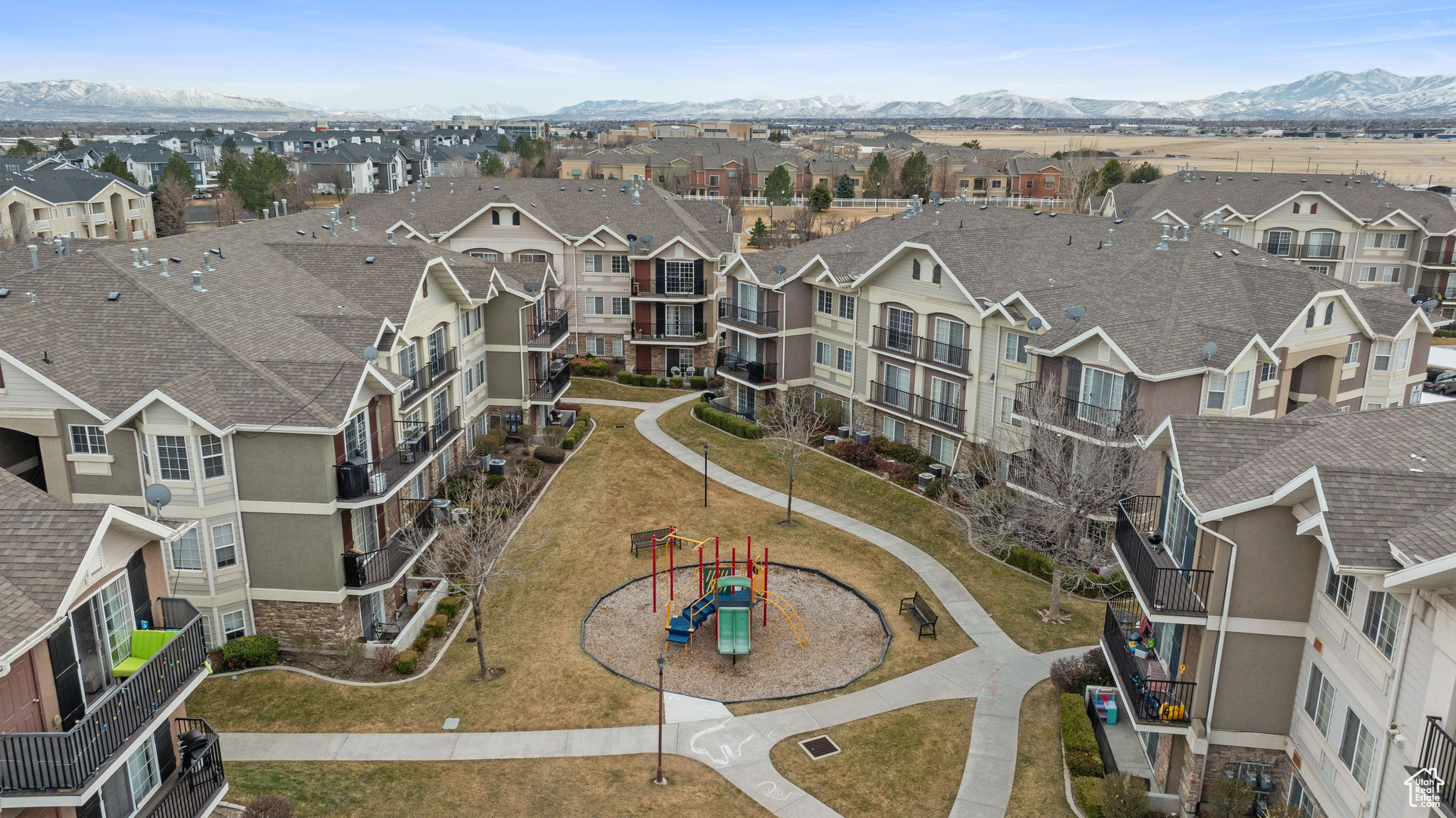 Drone / aerial view with a residential view and a mountain view