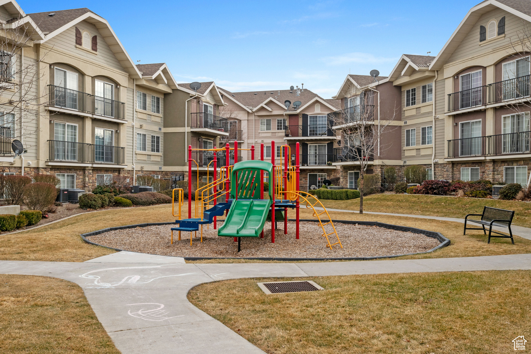 Community playground with a yard