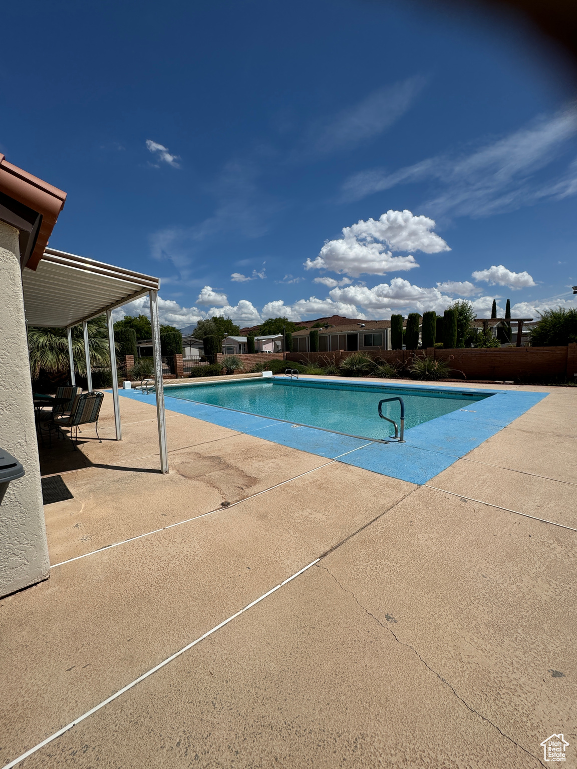 View of pool featuring a patio area and a fenced in pool