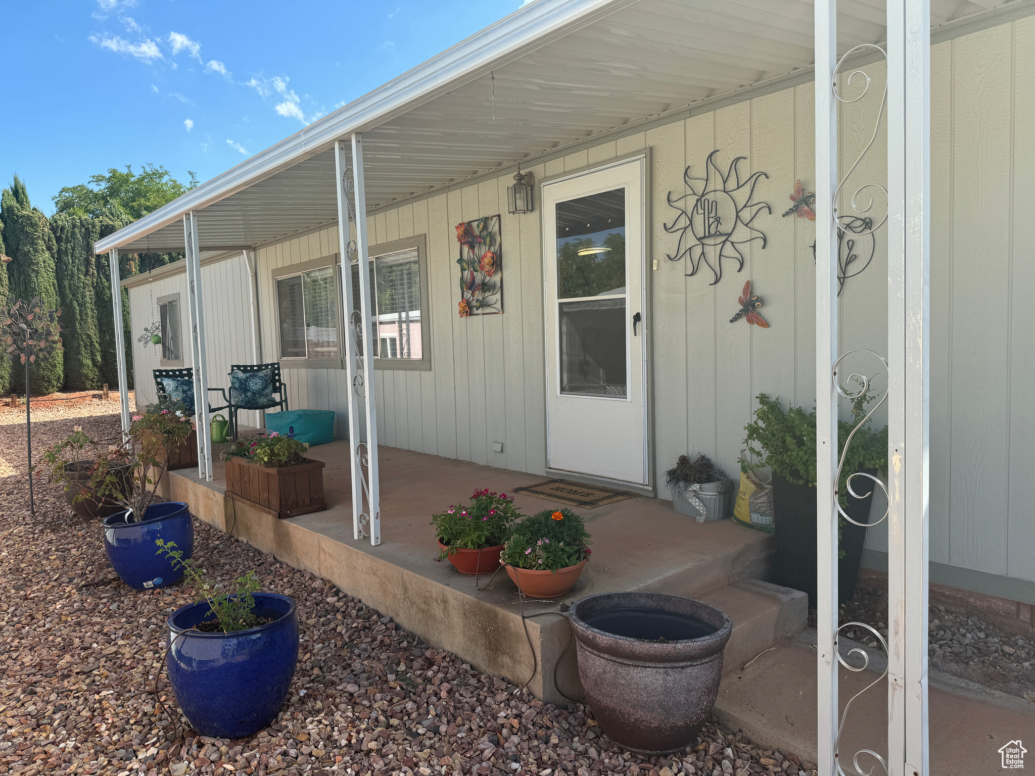 Entrance to property featuring a porch
