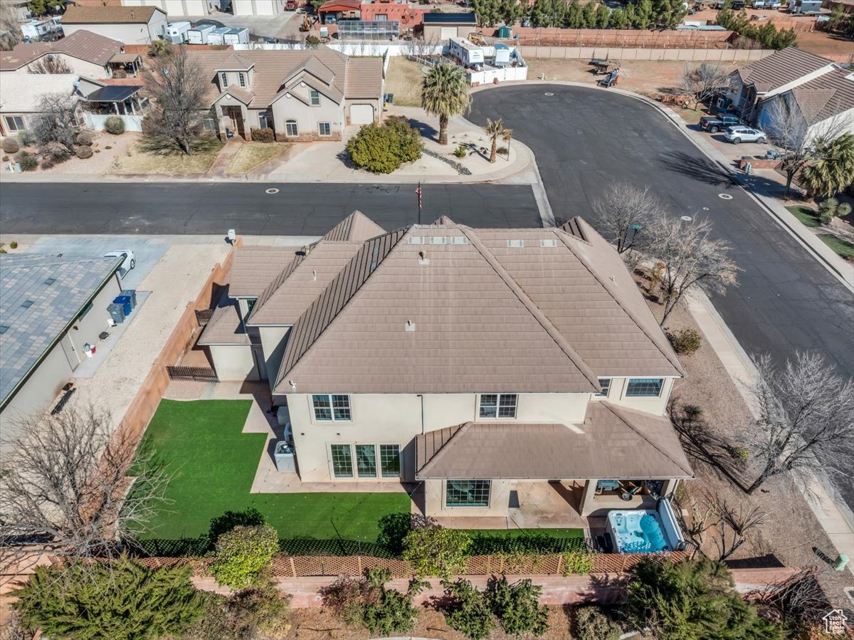 Birds eye view of property with a residential view