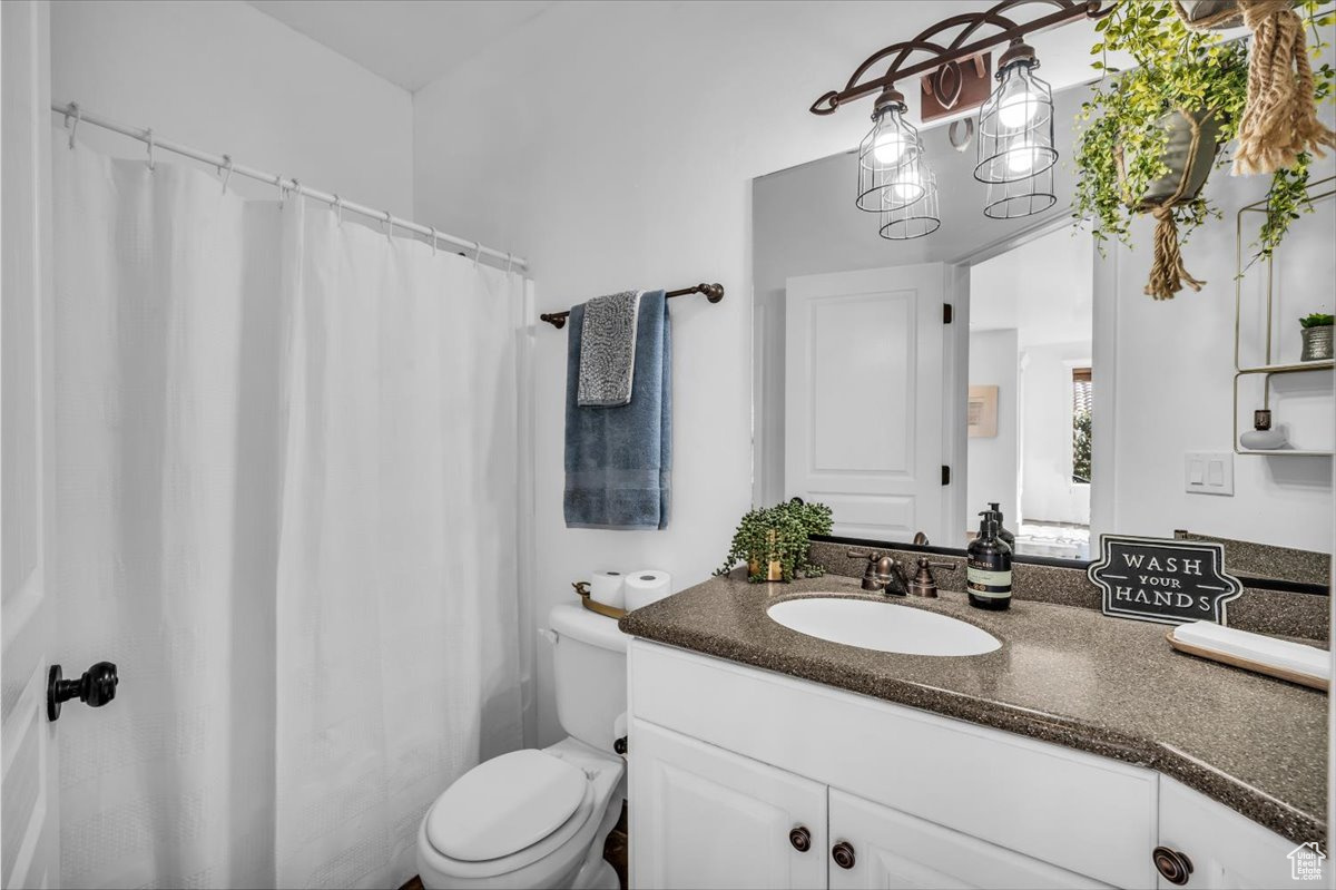 Bathroom with vanity and toilet