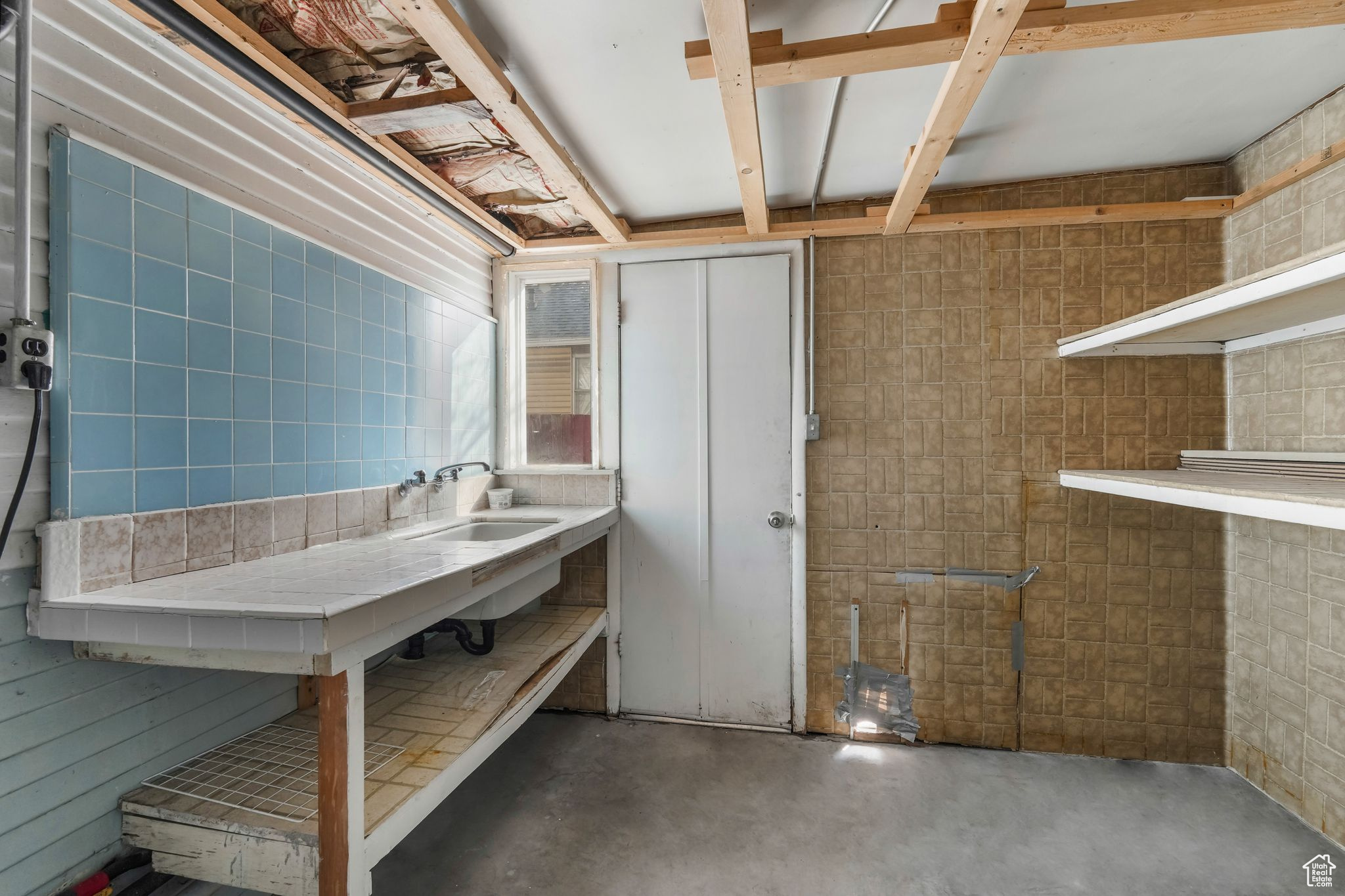 View of storage room/extension of the garage