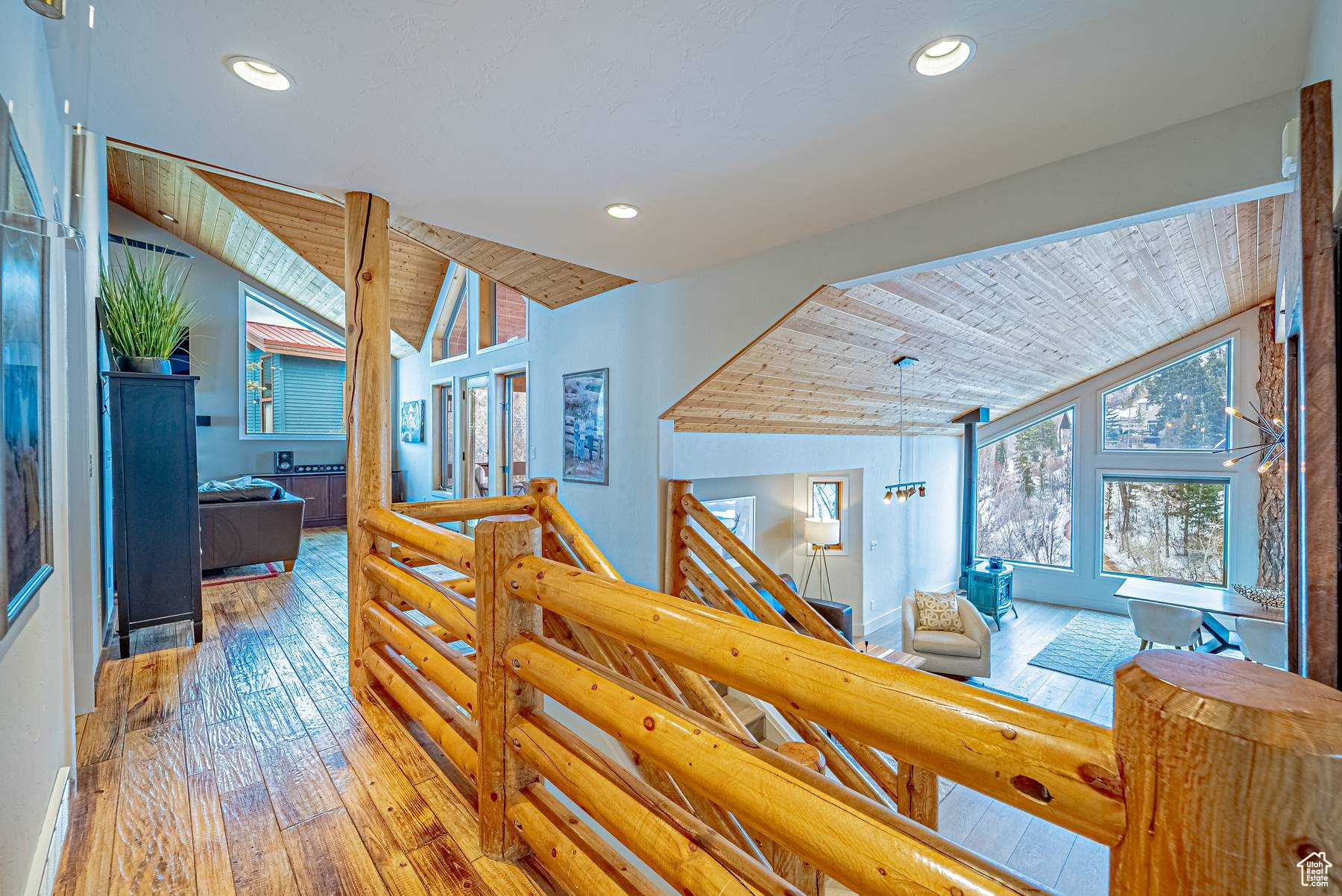 Hall featuring vaulted ceiling, wood ceiling, hardwood / wood-style flooring, and recessed lighting