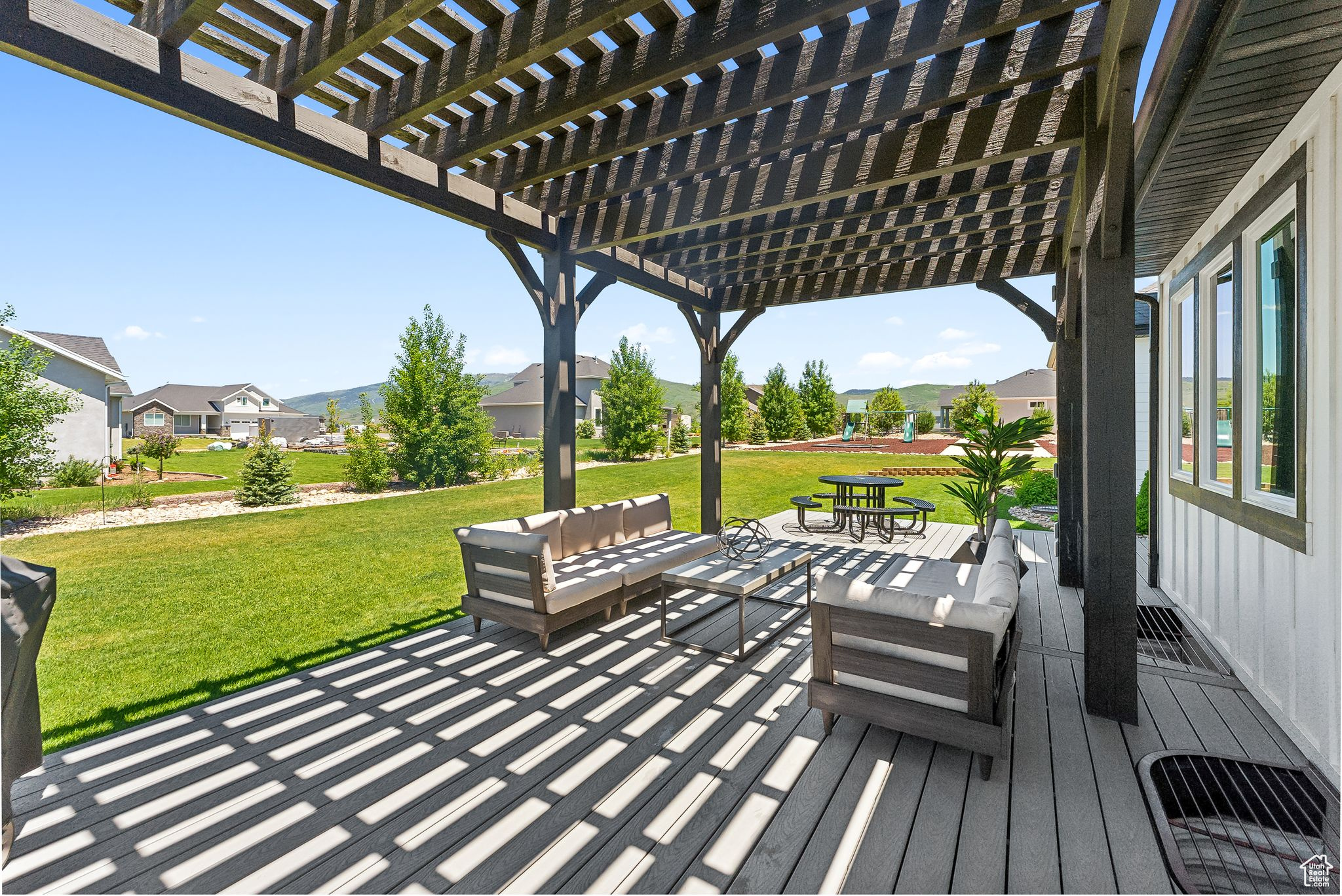 View of patio / terrace with outdoor dining space, a residential view, an outdoor hangout area, and a pergola