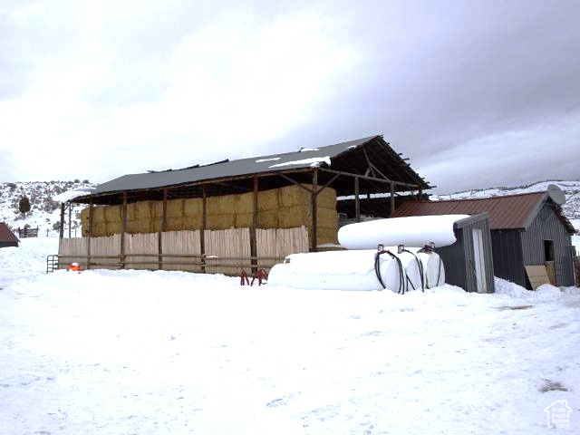 View of yard layered in snow