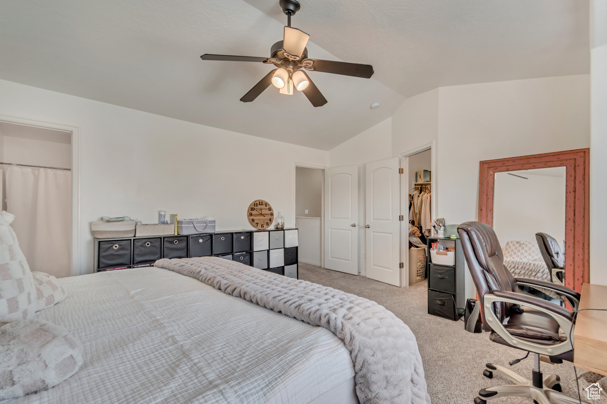 Bedroom featuring a walk-in closet and ensuite bathroom