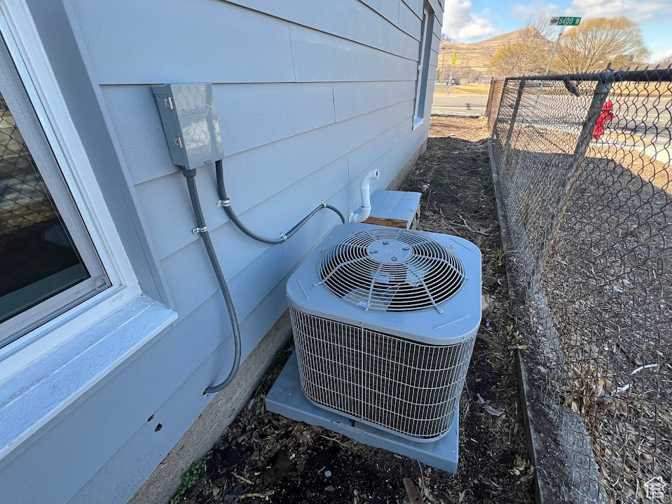 Details featuring fence and central air condition unit