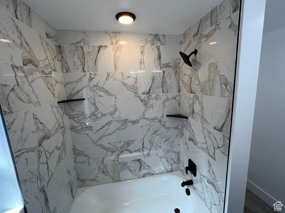 Full bathroom with  shower combination