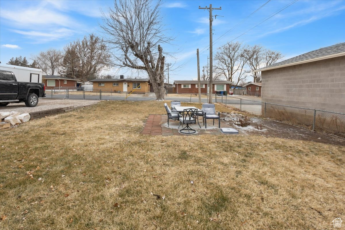 View of yard with a patio area