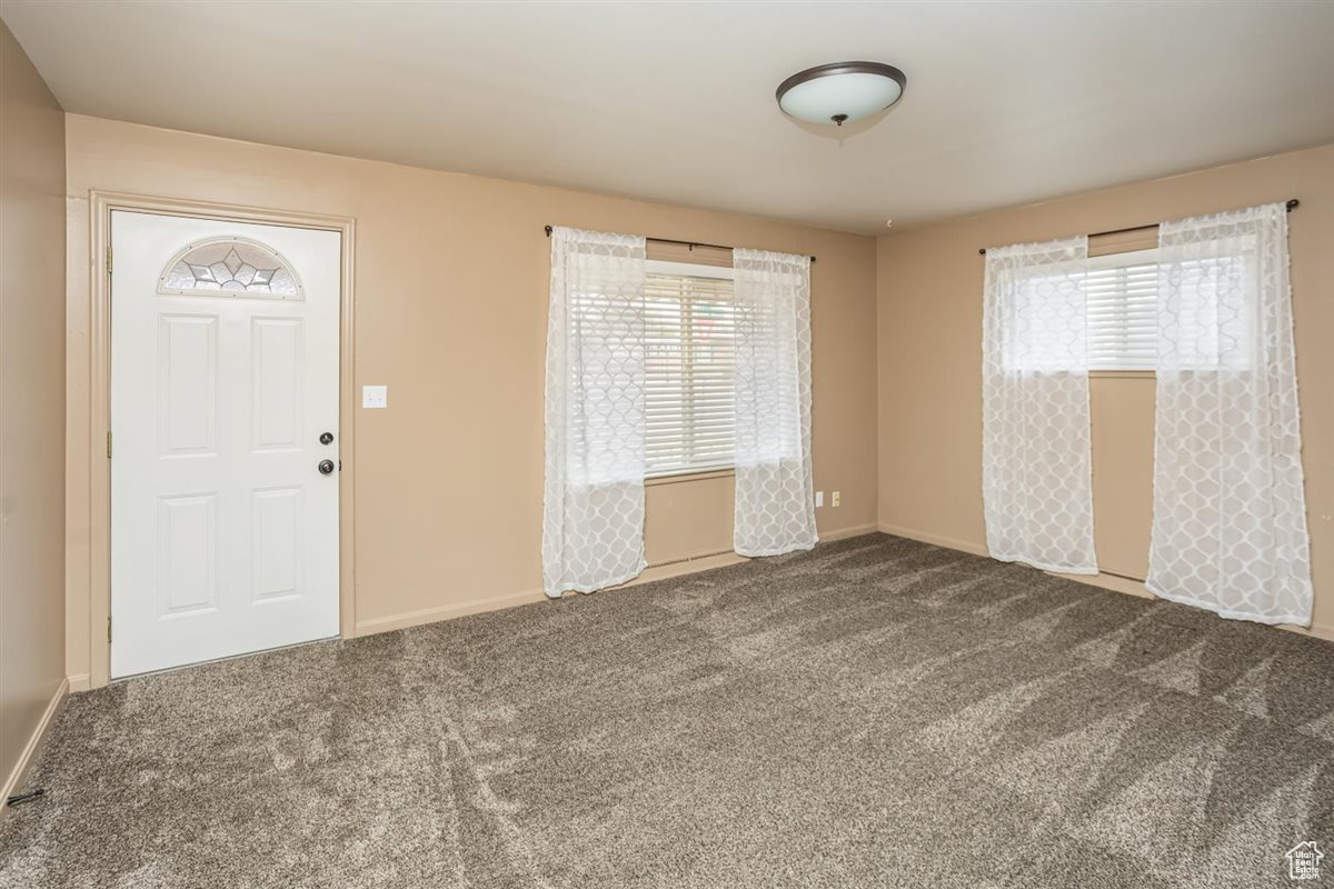 View of carpeted foyer entrance