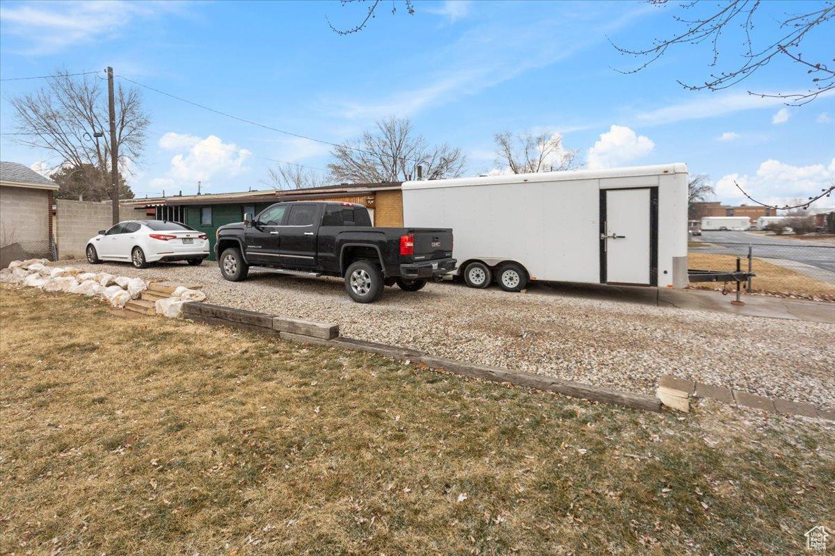 Exterior space with a yard