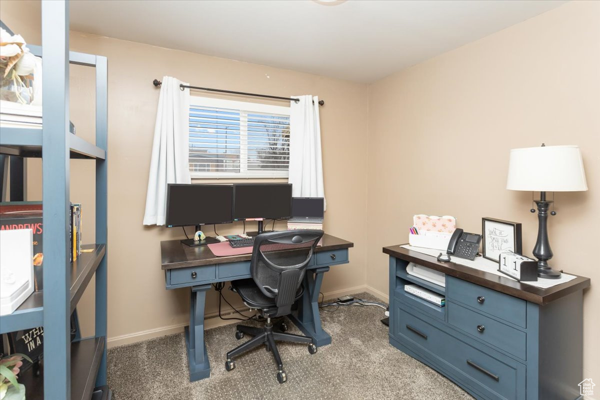 View of carpeted home office